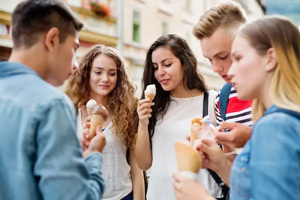 group of people with ice cream cones
